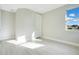 Bright room with one window, natural light, and neutral paint at 11464 Beau Repost Dr, Orlando, FL 32832