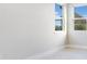 Bright room with two windows, natural light, and neutral paint at 11464 Beau Repost Dr, Orlando, FL 32832