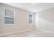 Bright room with two windows, natural light, and neutral paint at 11464 Beau Repost Dr, Orlando, FL 32832