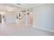 Bright living room featuring an open layout, coffered ceilings, and light hardwood floors at 11464 Beau Repost Dr, Orlando, FL 32832