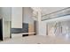 Expansive living space with a modern fireplace, stylish built-ins, and an elegant staircase at 11464 Beau Repost Dr, Orlando, FL 32832