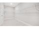 Spacious walk-in closet with installed shelving, offering plenty of storage at 11464 Beau Repost Dr, Orlando, FL 32832