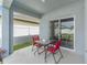 Outdoor patio with a table and chairs set, perfect for relaxing or entertaining at 1192 Sable Glen Dr, St Cloud, FL 34771