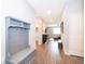 Inviting foyer with a built-in bench and coat rack, leading to an open living area at 12191 Sumter Dr, Orlando, FL 32824