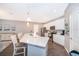 Bright kitchen with a large center island, stainless steel appliances, and modern finishes at 12191 Sumter Dr, Orlando, FL 32824