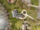 Luxury estate with a pool, circular driveway and lake access at 1404 Kelso Blvd, Windermere, FL 34786