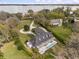 Aerial shot of a well-maintained property with a pool and waterfront access at 1404 Kelso Blvd, Windermere, FL 34786
