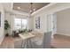 Bright and airy home office featuring neutral tones and comfortable seating at 15295 Rising View Dr, Montverde, FL 34756