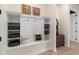 Mudroom with built-in shelving, a bench, and decorative pillows, offering practical storage at 15295 Rising View Dr, Montverde, FL 34756