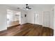 Inviting living room boasts hard flooring, recessed lights, open access to kitchen and fan at 1607 31St Nw St, Winter Haven, FL 33881