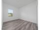 Bright bedroom with a large window and closet space at 16224 Sw 55Th Court Rd, Ocala, FL 34473