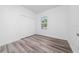 Bedroom with bright lighting, closet and luxury vinyl flooring at 16224 Sw 55Th Court Rd, Ocala, FL 34473