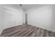 Bedroom featuring luxury vinyl floors, closet and bright natural light at 16224 Sw 55Th Court Rd, Ocala, FL 34473