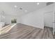 Spacious living room features luxury vinyl floors, recessed lights and bright lighting at 16224 Sw 55Th Court Rd, Ocala, FL 34473