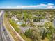 Aerial view showcases the community's proximity to I-95 and the nicely maintained landscaping at 163 Springwood Cir # D, Longwood, FL 32750
