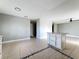 Open living room featuring neutral paint, tile flooring, and lots of natural light at 163 Springwood Cir # D, Longwood, FL 32750