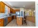 This well-appointed kitchen features stainless steel appliances, marble countertops, and a kitchen island at 1714 Golfview Dr, Kissimmee, FL 34746