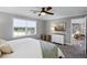 Bedroom with a ceiling fan, a window and furniture, featuring a comfortable view at 2003 Woodcrest Dr, Winter Park, FL 32792