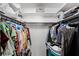 Spacious walk-in closet with shelving and ample storage for an organized wardrobe at 2003 Woodcrest Dr, Winter Park, FL 32792