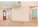 Bright living area featuring tile floors, neutral walls, and an entryway to other spaces at 2007 Cornell Pl # 4, Port Orange, FL 32128