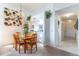 Dining area featuring contemporary decor with a kitchen pass through at 3109 Bear Path, Kissimmee, FL 34746