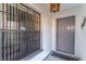 Entryway with a security system sticker on the window, showing a focus on safety at 3109 Bear Path, Kissimmee, FL 34746