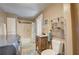 Bathroom with a vanity, toilet, bathtub, shower, and laundry with washing machine at 3512 Central Ave, Coleman, FL 33521