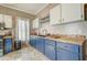 Bright kitchen with wooden countertops, mosaic tile, and updated appliances at 3512 Central Ave, Coleman, FL 33521