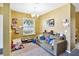 Cozy bedroom with carpeted floor, overhead lighting, and ample space for a play area at 3528 Seneca Club Loop # 103 - C, Orlando, FL 32808
