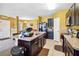 Large kitchen with a central island providing ample countertop space at 3528 Seneca Club Loop # 103 - C, Orlando, FL 32808
