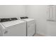 Laundry room featuring modern appliances at 4514 Windy Oak Way, St Cloud, FL 34772