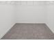 A large walk-in closet features wall-mounted shelving at 4514 Windy Oak Way, St Cloud, FL 34772