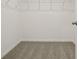 Empty walk-in closet with wire shelving and neutral carpeting at 4673 Cross Prairie Pkwy, St Cloud, FL 34772
