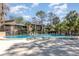 Large community pool offering plenty of space to swim, relax, and socialize with residents at 4828 Pebble Beach Dr # A, Orlando, FL 32811