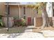 Inviting home exterior with a quaint front walkway and lush flowering bushes at 4828 Pebble Beach Dr # A, Orlando, FL 32811