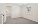 Well-lit bedroom featuring plush carpeting and ample natural light at 5099 Railroad Vine Aly, Winter Garden, FL 34787