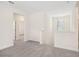 Upstairs hallway with neutral carpeting and natural light at 5099 Railroad Vine Aly, Winter Garden, FL 34787