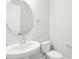 Powder room with pedestal sink and modern fixtures at 5106 Railroad Vine Aly, Winter Garden, FL 34787