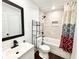 Bathroom with bathtub and shower, a modern vanity with a black faucet, and new fixtures at 5390 E Hinson Ave, Haines City, FL 33844