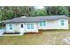 Charming single-story home featuring a newer roof, updated windows and a freshly painted exterior at 5390 E Hinson Ave, Haines City, FL 33844