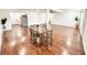 Open concept living room featuring hardwood floors and a dining area that is perfect for Gathering gatherings at 5390 E Hinson Ave, Haines City, FL 33844