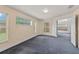 Bright bedroom with natural light and an open doorway at 5580 Berwood Dr, Orlando, FL 32810
