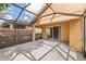 The screened porch offers an outdoor space leading to a private backyard at 5580 Berwood Dr, Orlando, FL 32810