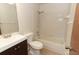 Bathroom with vanity, toilet and tub/shower combo with white tile surround at 559 Northbridge Dr, Altamonte Springs, FL 32714