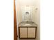 Cozy half-bathroom features a custom sink, marble countertop and modern lighting at 559 Northbridge Dr, Altamonte Springs, FL 32714