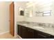 Bathroom with a double vanity, granite countertops, and ample lighting at 559 Northbridge Dr, Altamonte Springs, FL 32714
