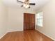 Bedroom with ceiling fan, closet, and hardwood flooring at 559 Northbridge Dr, Altamonte Springs, FL 32714