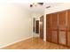 Bedroom features wood laminate flooring and closet with bi-fold doors at 559 Northbridge Dr, Altamonte Springs, FL 32714