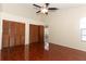 Bedroom with vaulted ceilings, closet space, and hardwood flooring at 559 Northbridge Dr, Altamonte Springs, FL 32714
