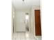 Bright entryway featuring tiled flooring and neutral walls, leading into the home at 559 Northbridge Dr, Altamonte Springs, FL 32714